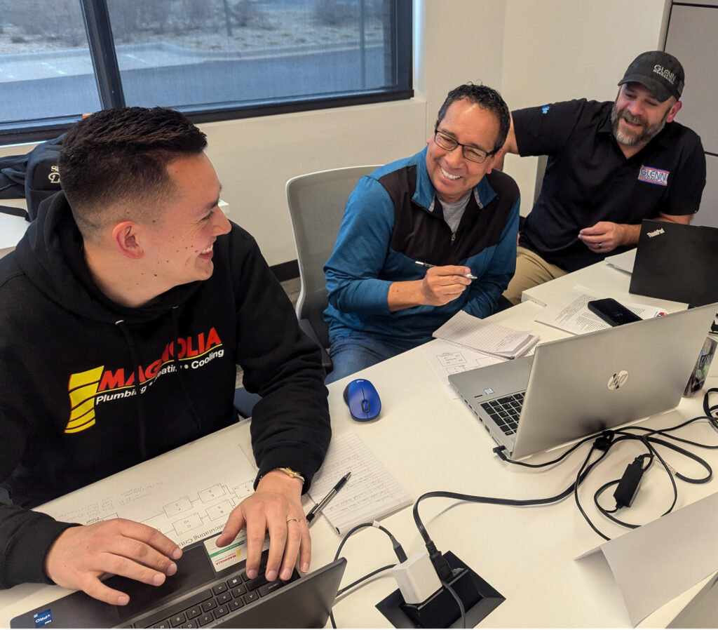 Small group work at the 2025 PHCC Essentials of Project Management class.