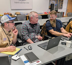 Small group work at the PHCC project management class.