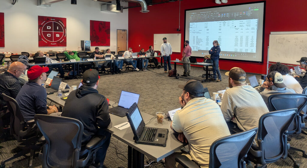 PHCC Foremen Workshop attendees presenting info at Milwaukee Tool Headquarters